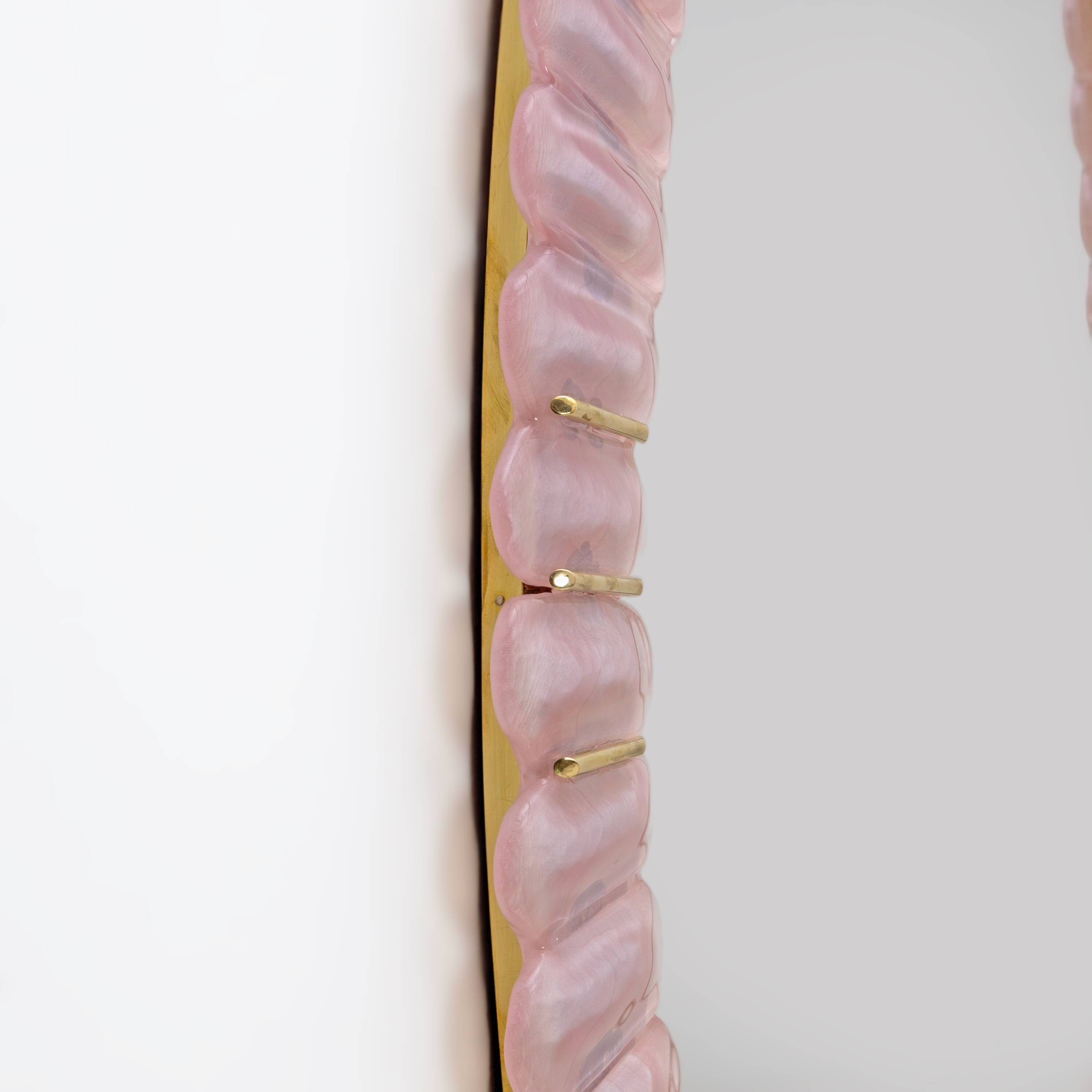Italian oval mirror in brass and pink blown Murano glass