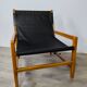 Leather and teak armchair