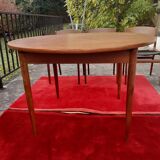 Roundtable with extension cords and chairs from the 1960s