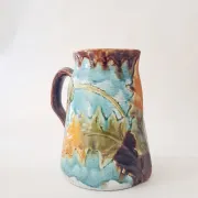 Old glazed stoneware pitcher - autumn