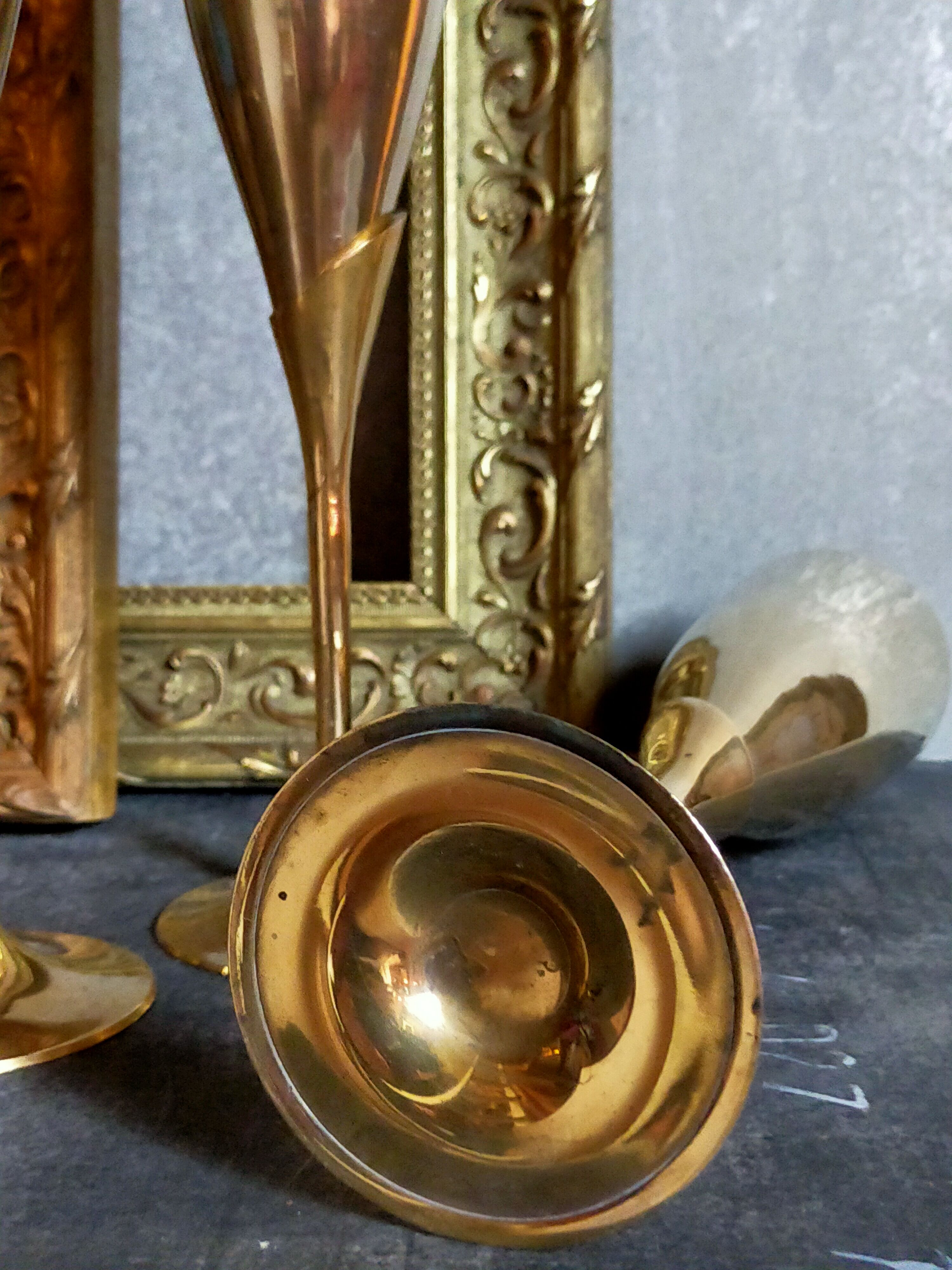 Six brass champagne coupes