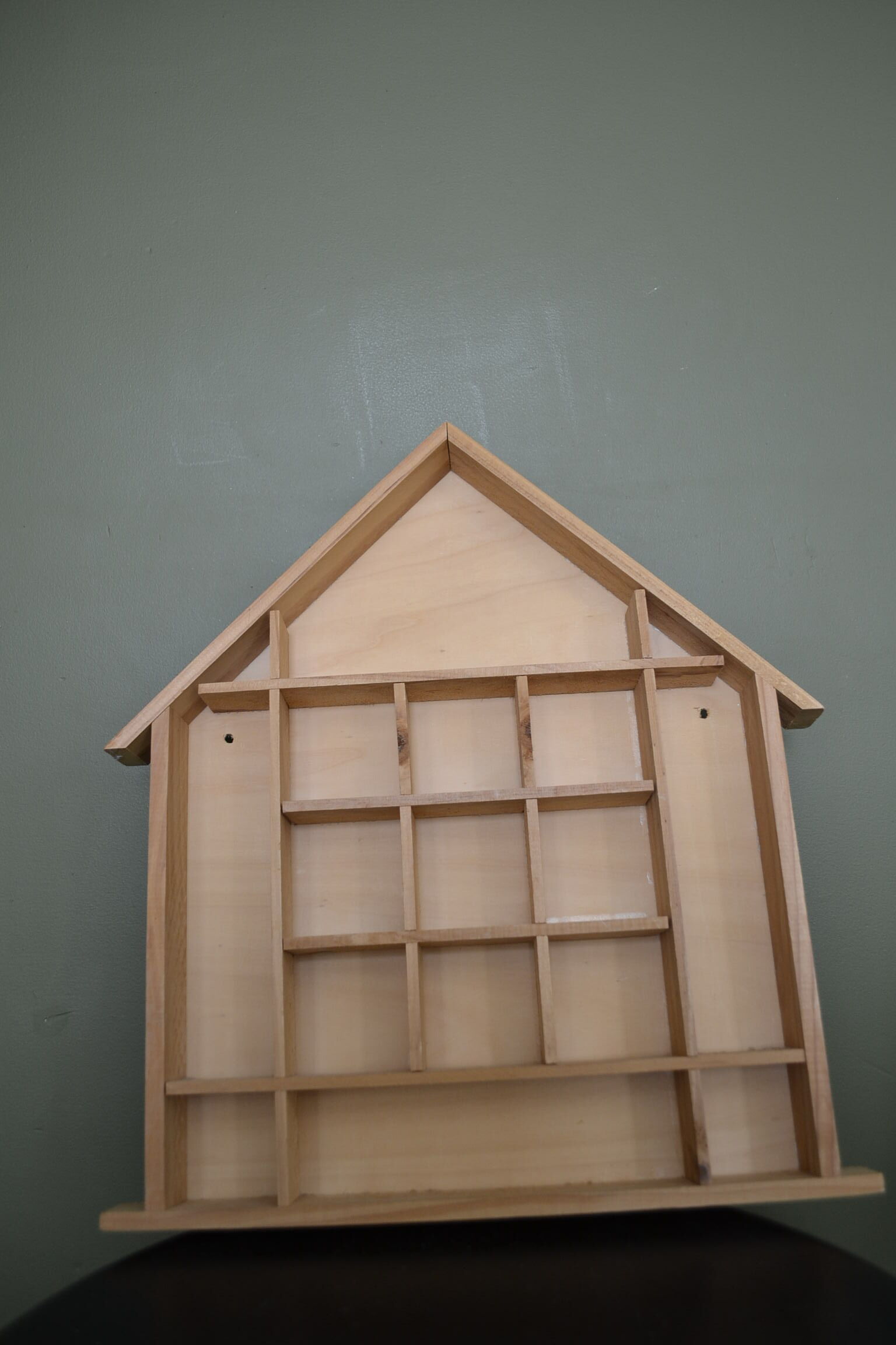 Wooden shelf shaped house