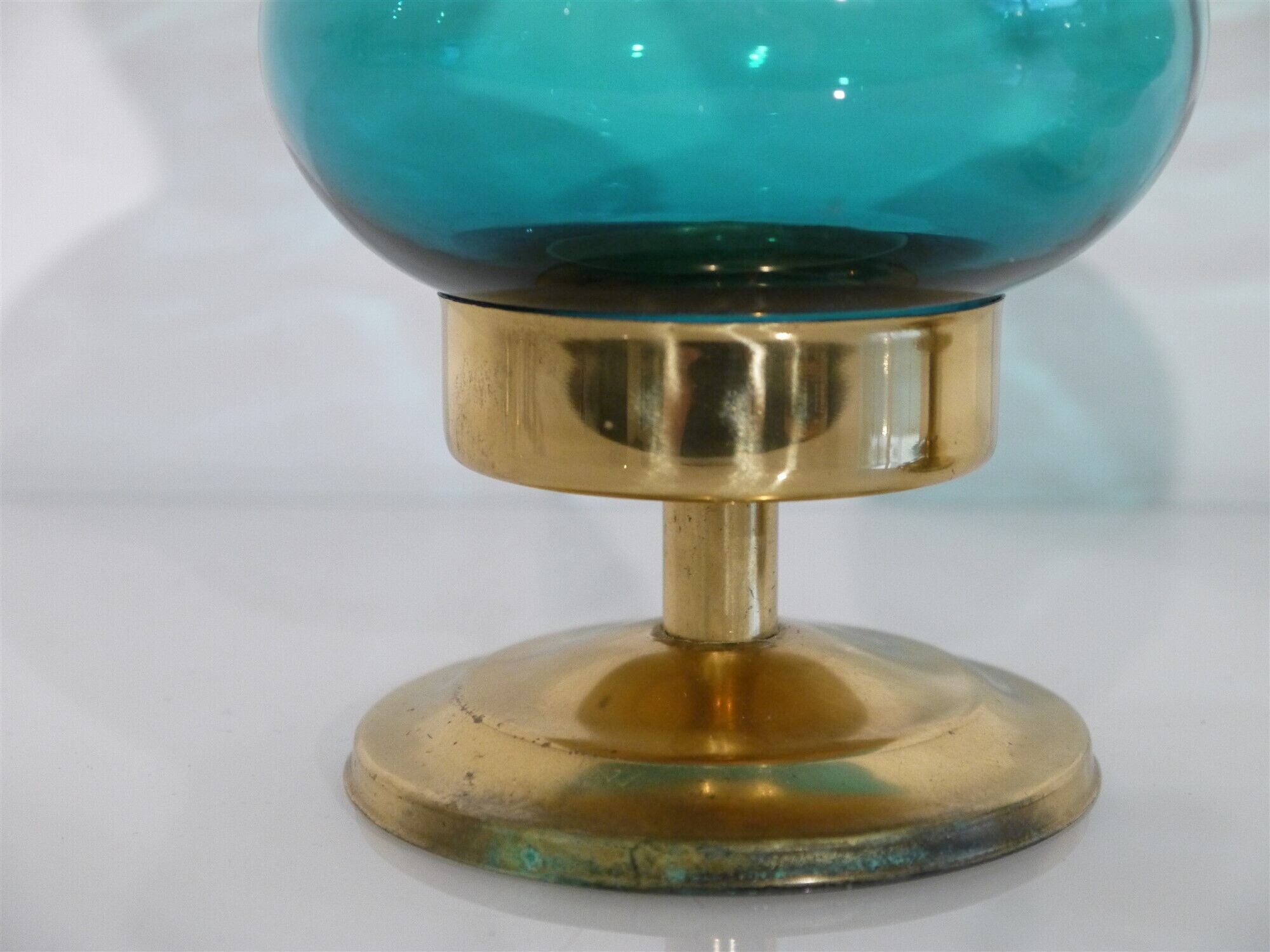 Pair of Scandinavian candlesticks in brass and coloured glass
