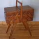 Worker sewing box feet compass