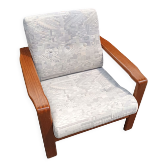 Scandinavian armchair in solid teak from the 1960s.