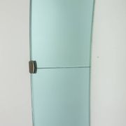 Two-tone glass console mirror with gilded brass. Circa 1950.