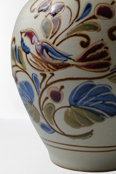 Vintage ceramic vase with bird decoration, signed.
