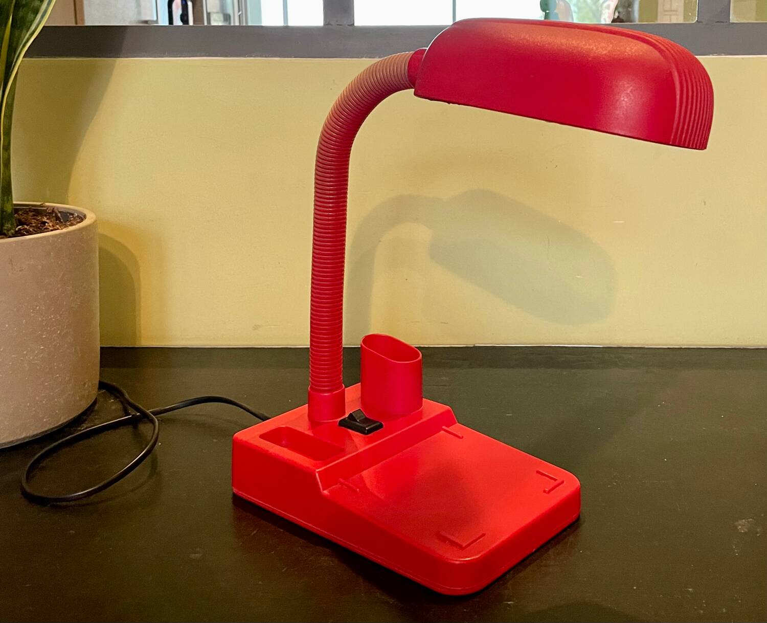 Vintage red articulated desk lamp