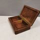 Wooden trinket box for storing jewellery, cigarettes or similar items.