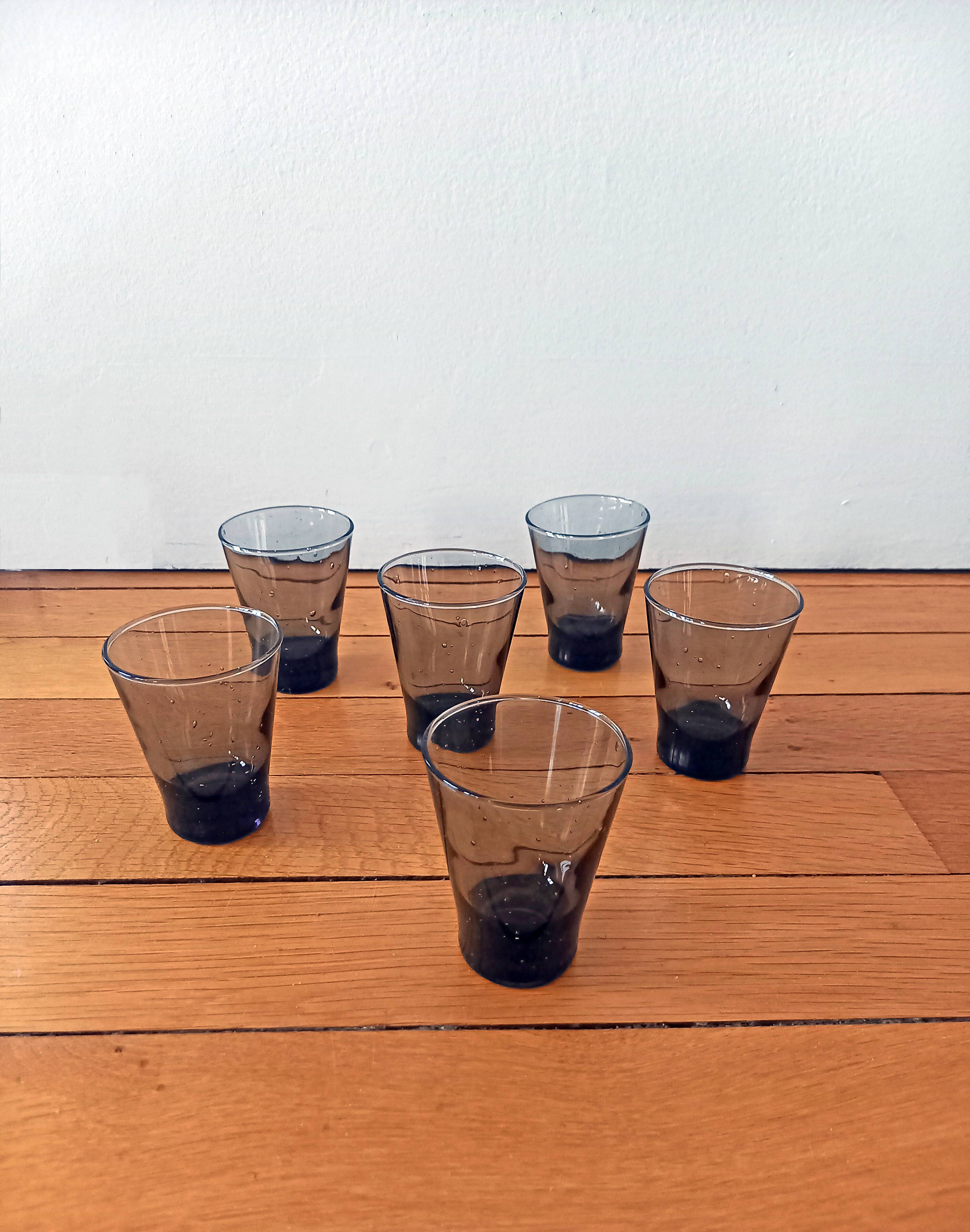 Set of 6 small antique grey blown glass aperitif glasses.