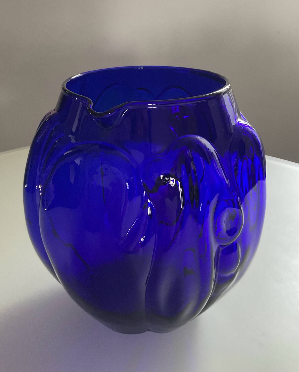 Vintage cobalt blue glass pitcher by Henry Dean