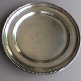 round plate in punched silver metal