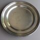 round plate in punched silver metal