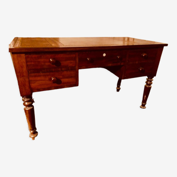 Antique desk in mahogany with leather top