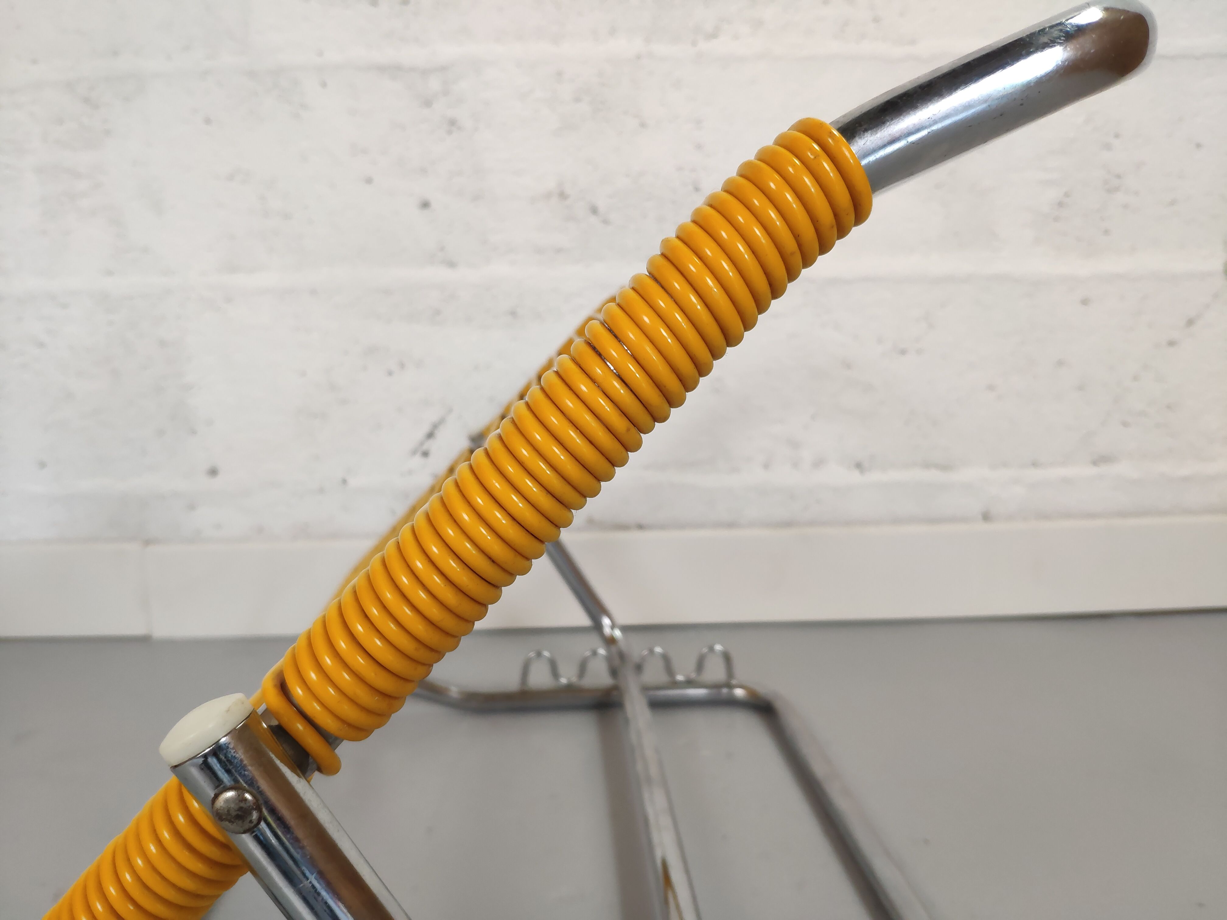 Yellow scoubidou head rest and vintage chrome metal