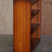 Pair of open dwarf bookshelves in mahogany by Shaws of London.