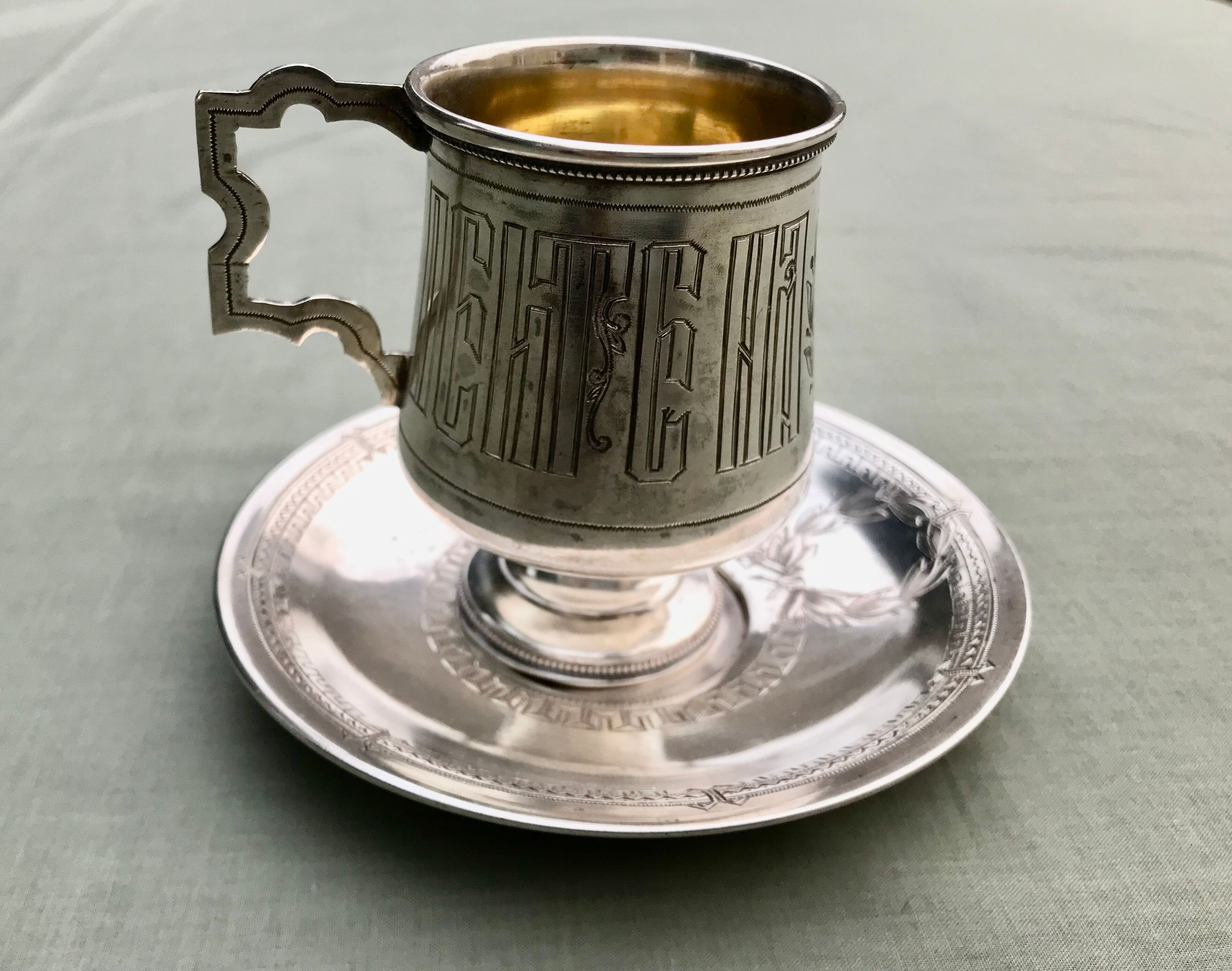 Cup and saucer Russian silver metal
