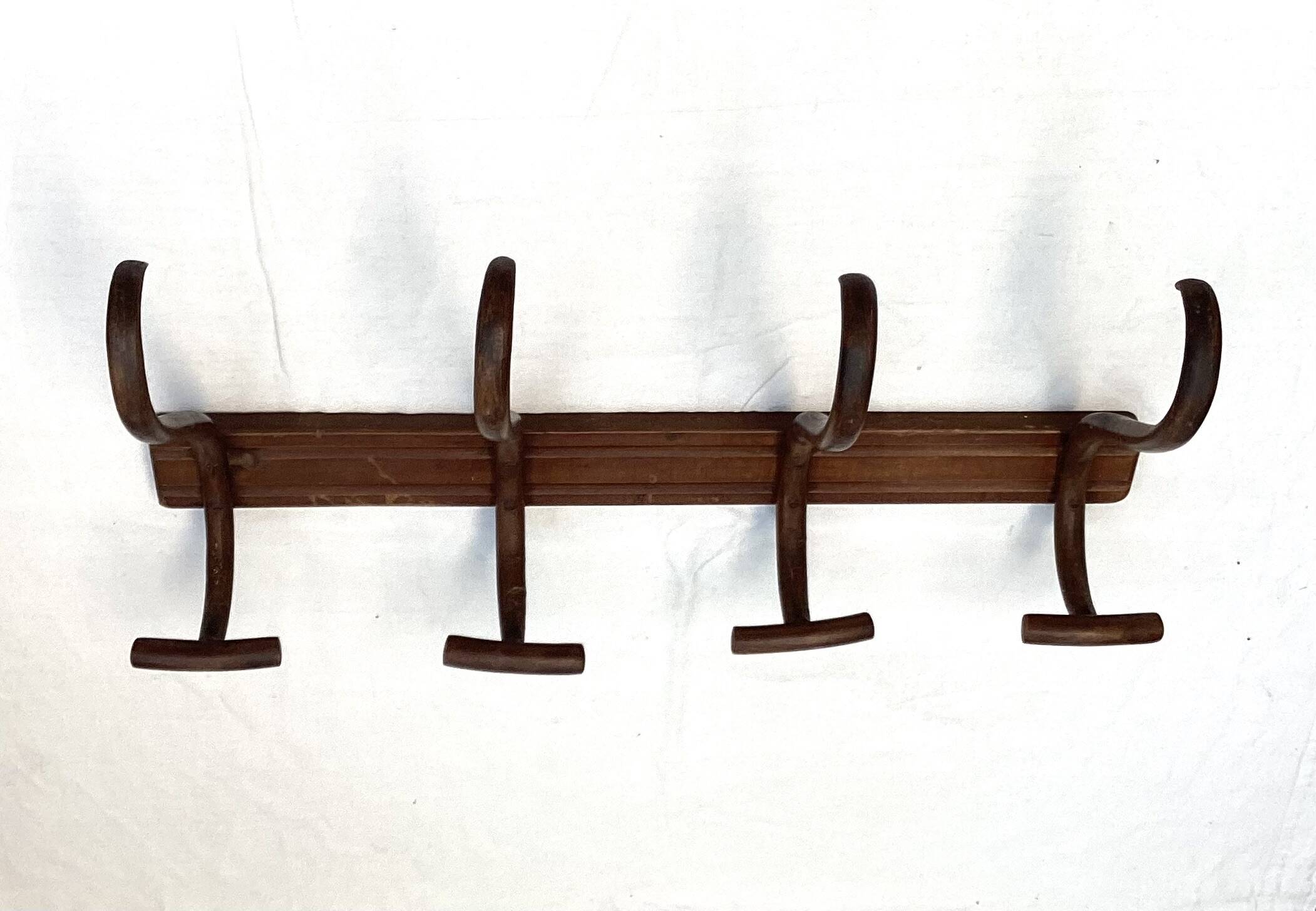 Coat rack signed Thonet with four hooks dimensions: height -32cm - width - 69cm-