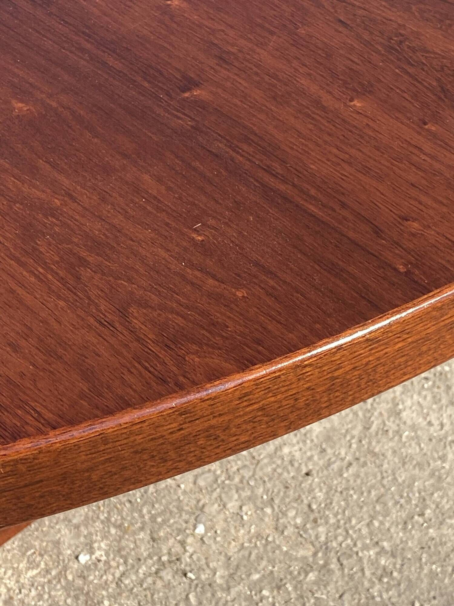 Baumann round oval extendable Scandinavian table in rosewood with 2 extensions.