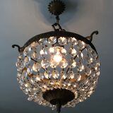 Old chandelier with bronze stamps