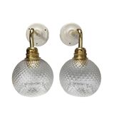 Pair of chiseled glass wall sconces