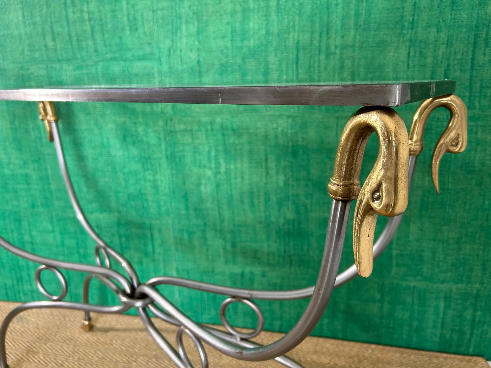 Polished steel and brass console, probably Maison Jansen, France, mid-century modern Hollywood Regency.