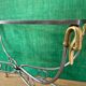 Polished steel and brass console, probably Maison Jansen, France, mid-century modern Hollywood Regency.
