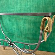 Polished steel and brass console, probably Maison Jansen, France, mid-century modern Hollywood Regency.