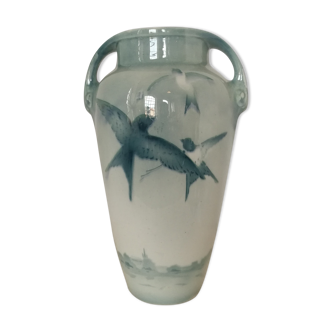 Blue vase with swallows
