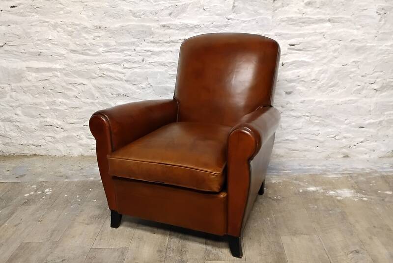 Restored horsehair club chair with curved back