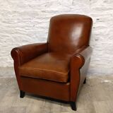 Restored horsehair club chair with curved back