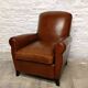 Restored horsehair club chair with curved back