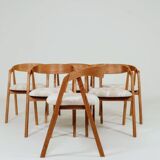 Set of 6 rustic oak wood dining chairs in safari beige.