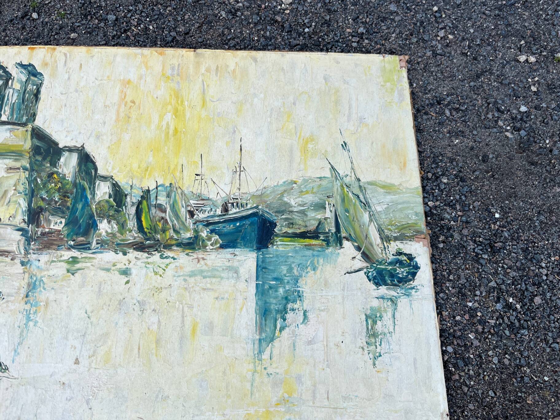 Animated view of a table with sailboats, signed.