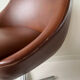 Fauteuil pivotant années 70 simili cuir