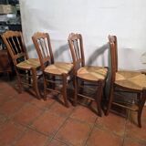 4 rustic farmhouse chairs made of wood and straw