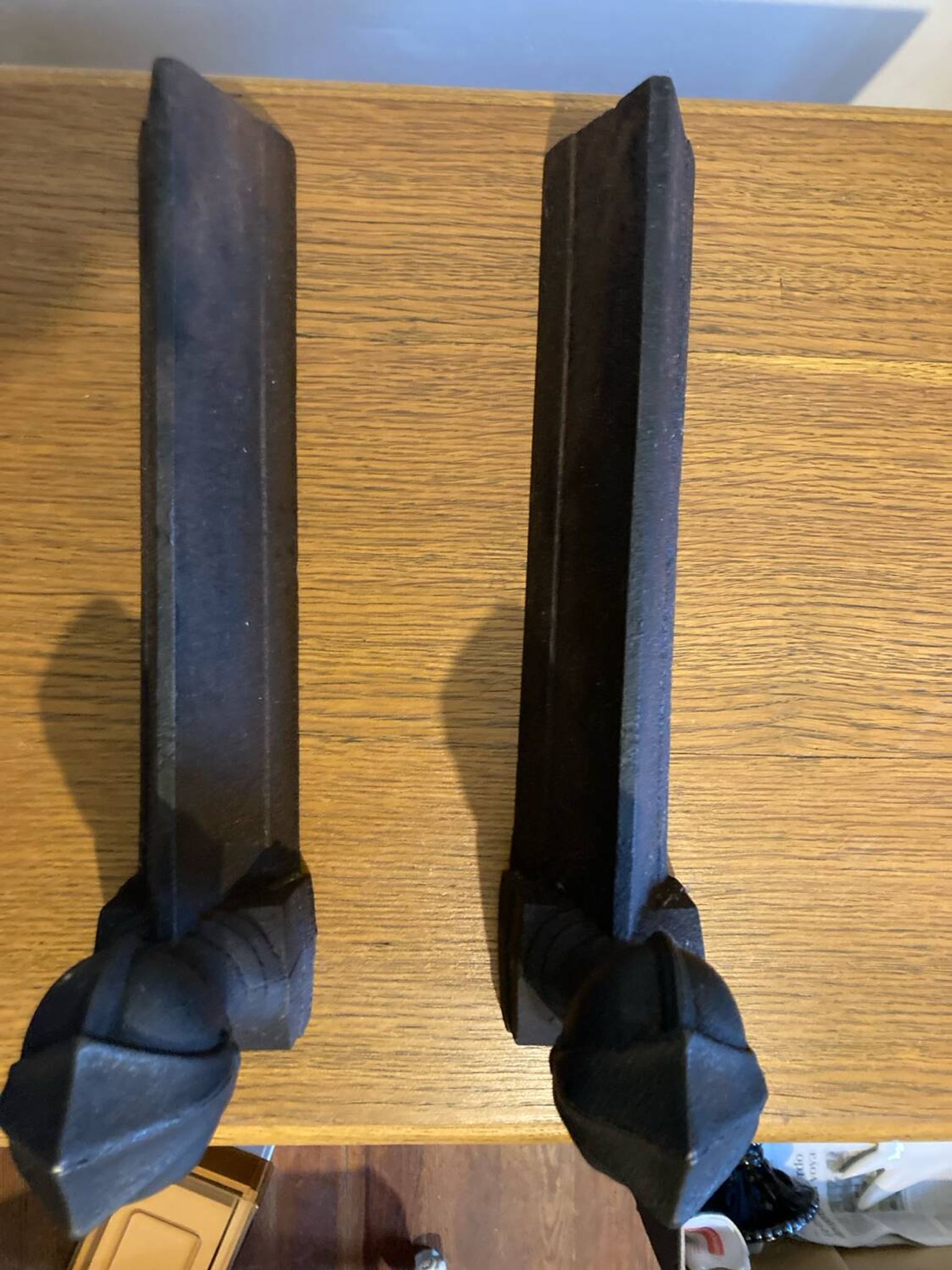 Pair of antique cast iron fire dogs