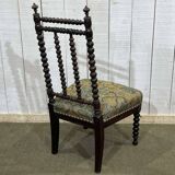 Chair in turned wood and rosewood veneer, early 20th century