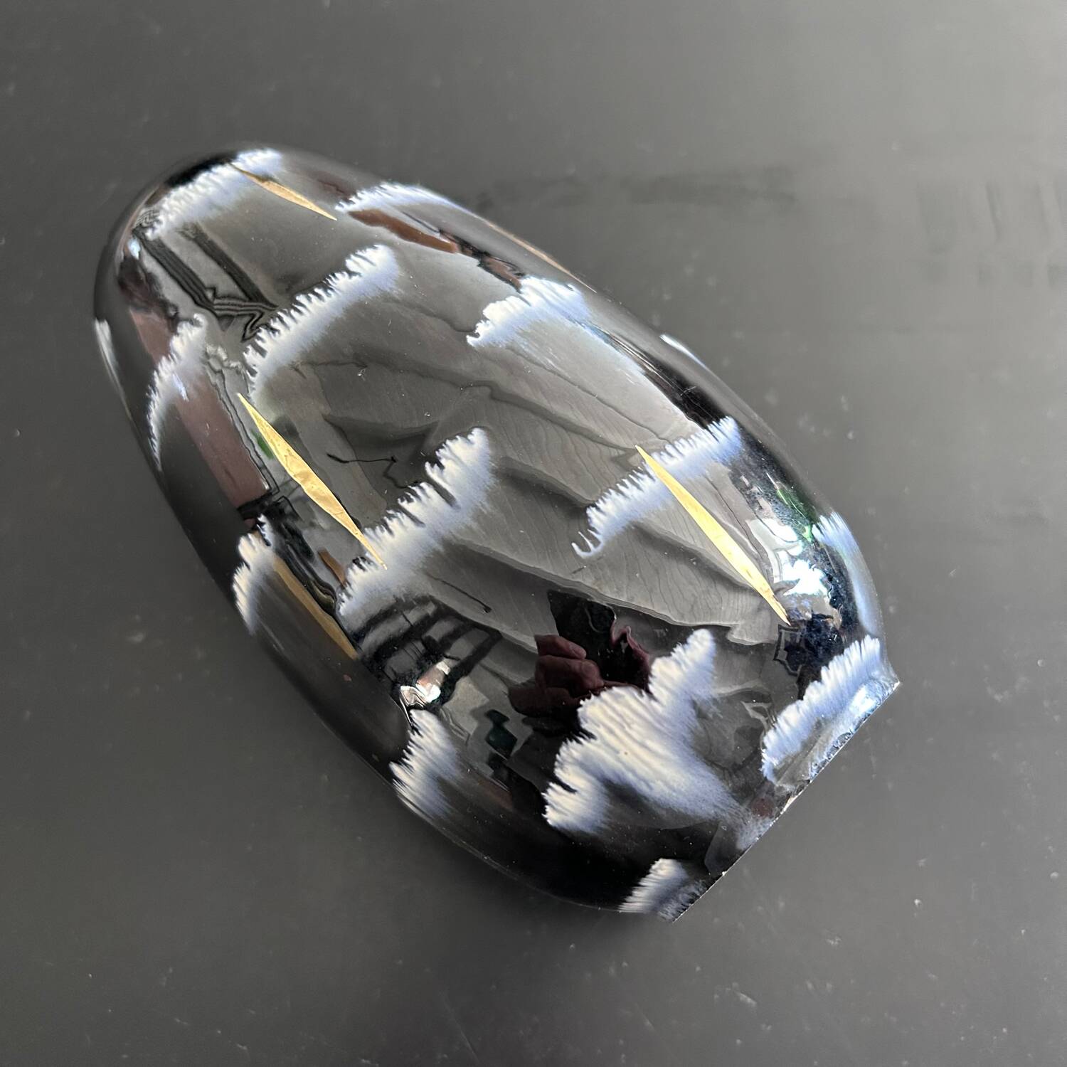 Black, white and gold art deco vase