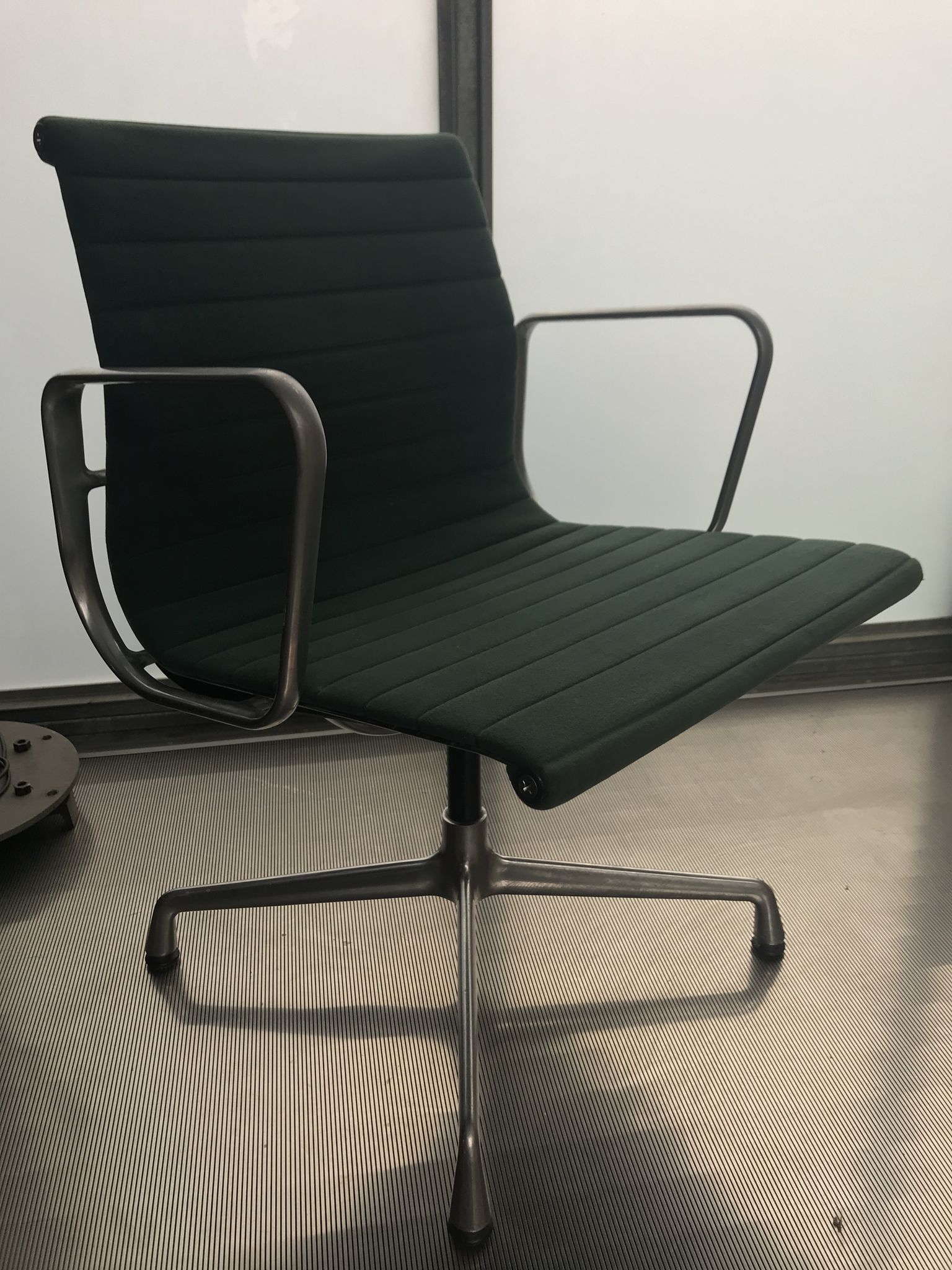 EA107 armchair by Charles and Ray Eames for Vitra