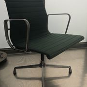 EA107 armchair by Charles and Ray Eames for Vitra