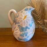 pitcher of daisies