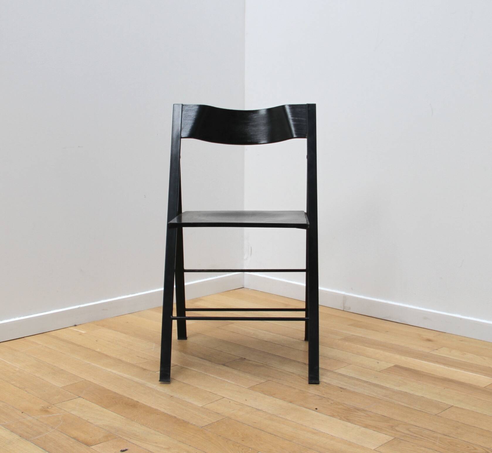 Suite of 12 folding designer chairs