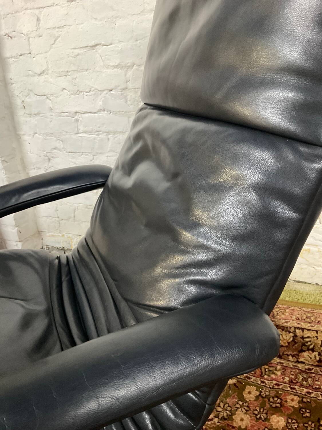 Jori black leather relax armchair from the 80s