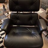 Chair and ottoman by Charles Eames, Herman Miller edition.