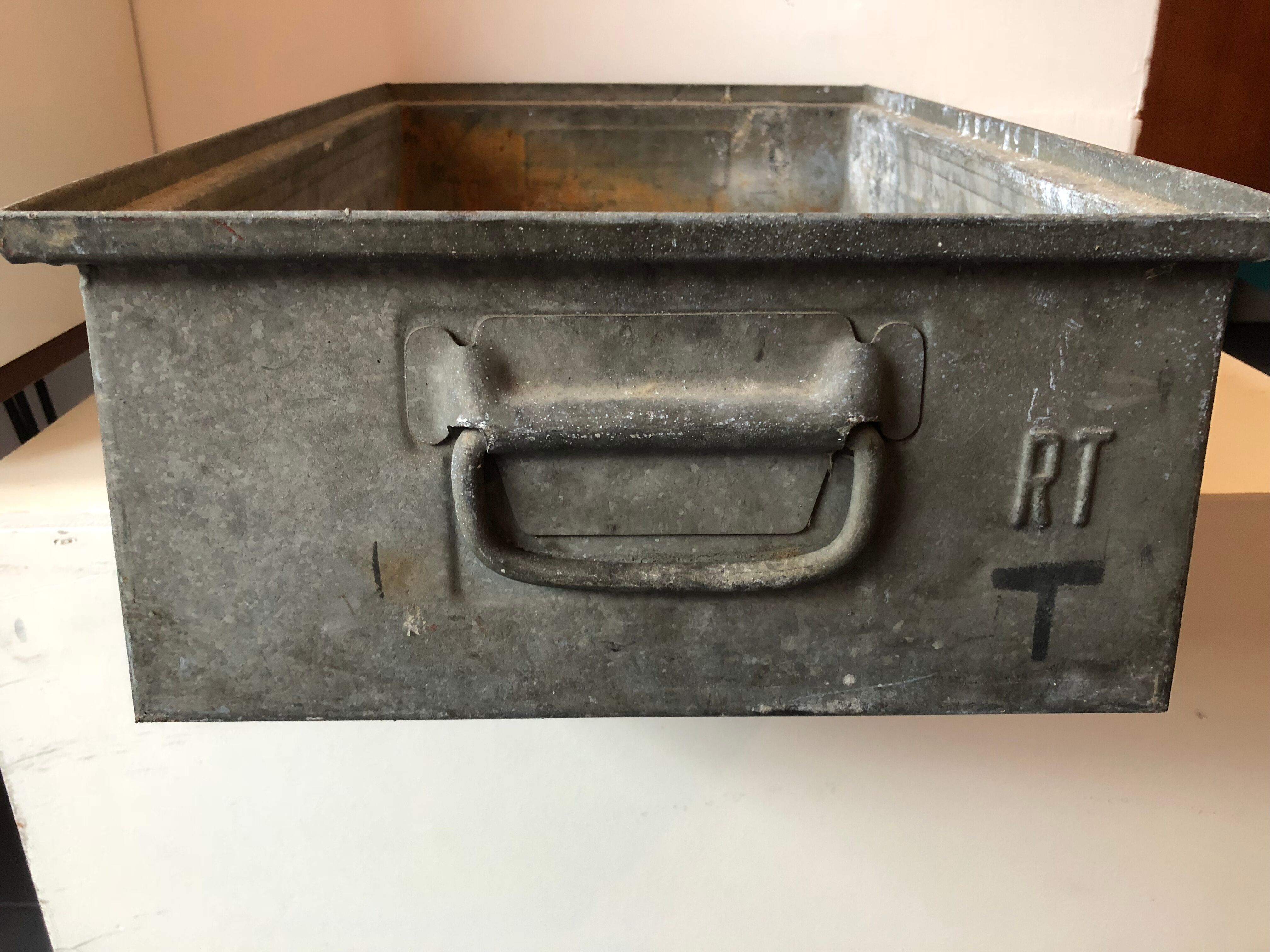 Old galvanized metal locker basket