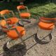 Four stainless steel armchairs from the 70s