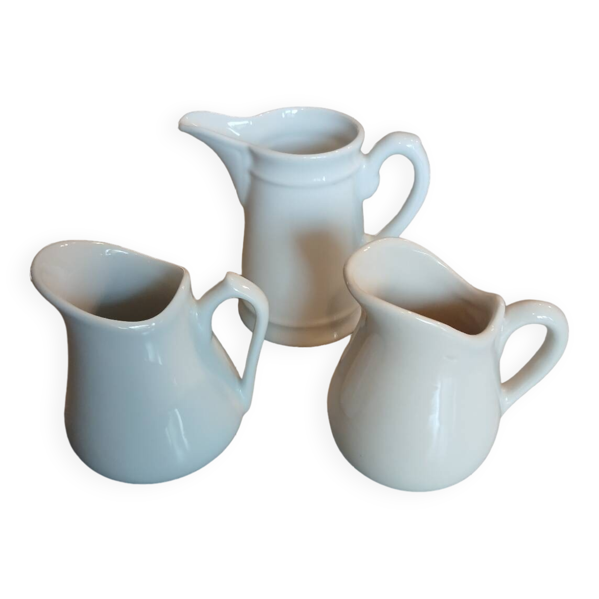 3 small antique porcelain pitchers/milk pots