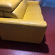 Yellow leather convertible sofa made in Italy.