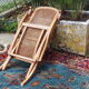 Fauteuil pliant canné en bois massif
